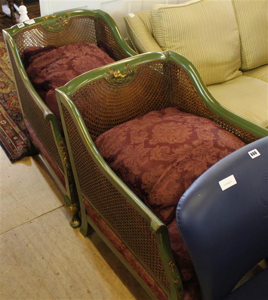 Pair of green japanned bergere armchairs